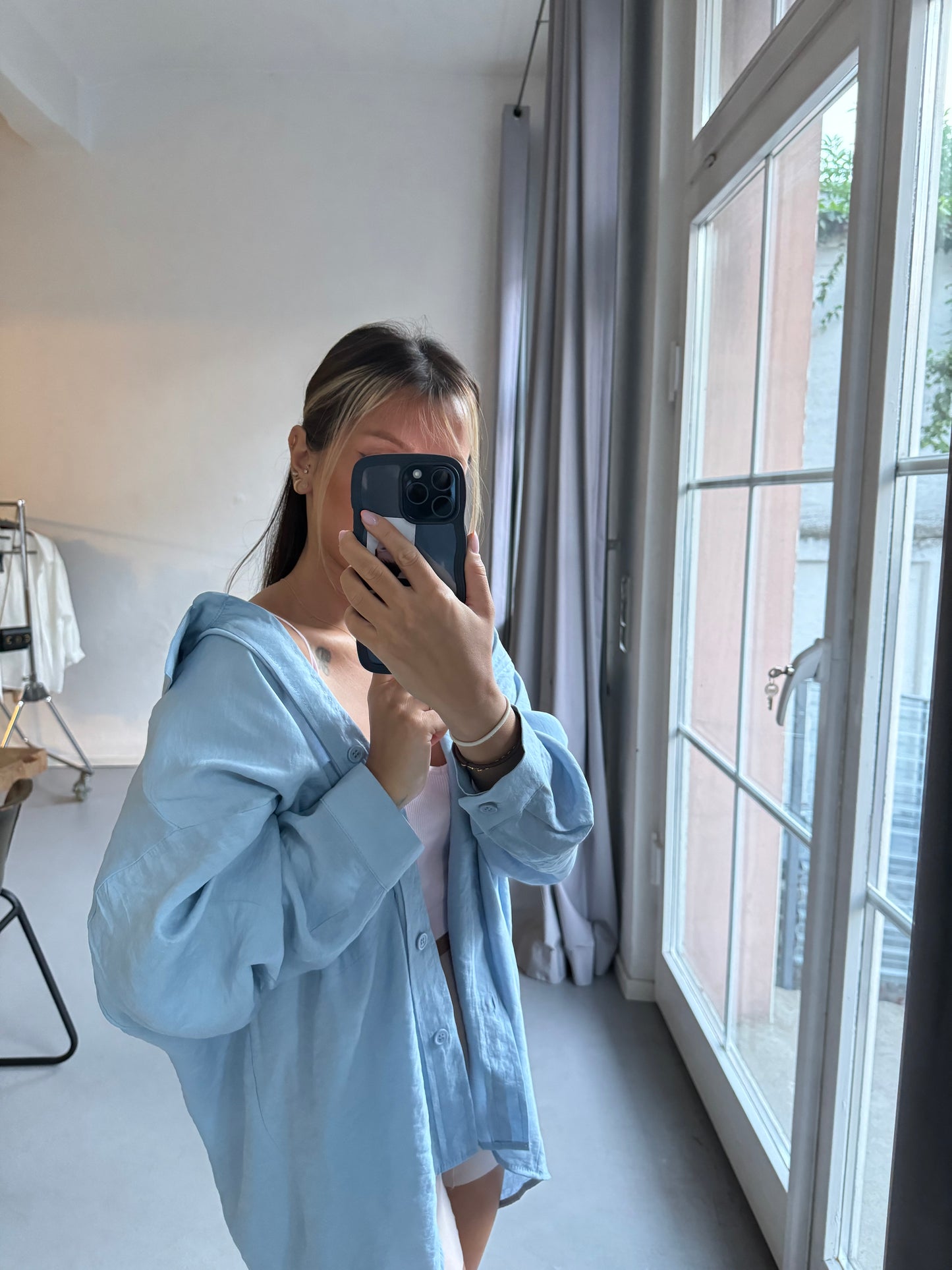 Baby blue oversized blouse in a casual look