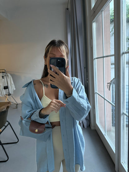 Baby blue oversized blouse in a casual look