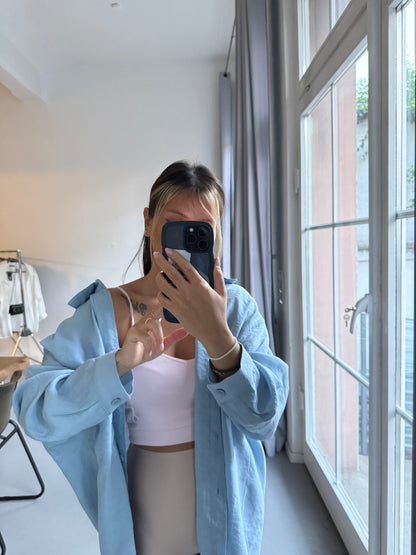 Baby blue oversized blouse in a casual look