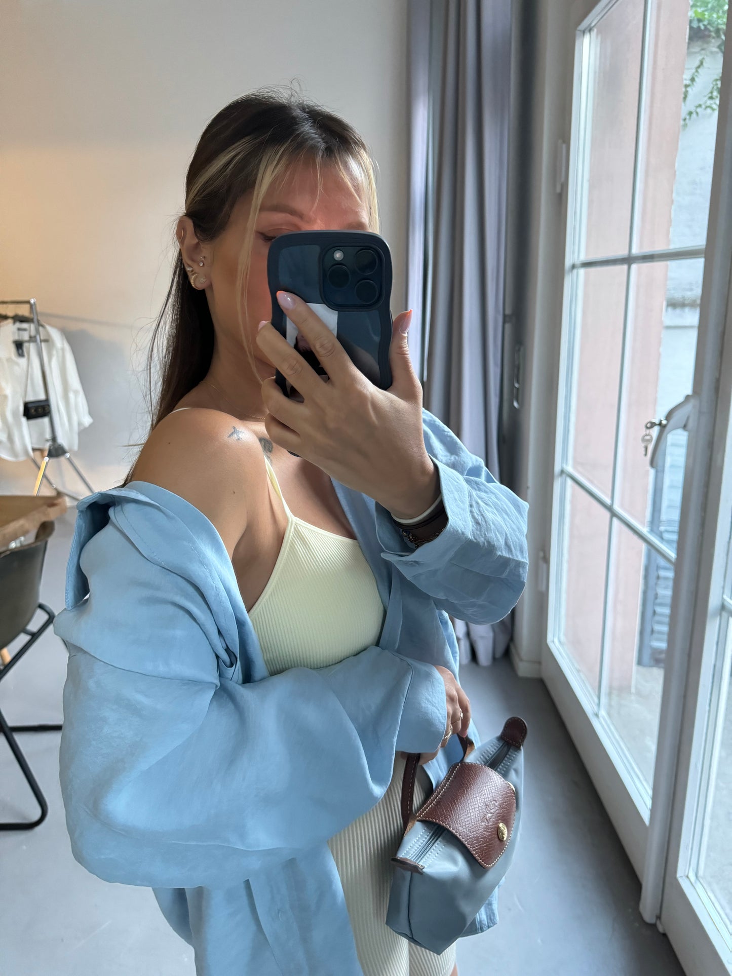 Baby blue oversized blouse in a casual look